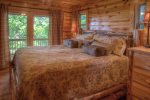 Master bedroom with easy walkout to the wrap around porch 